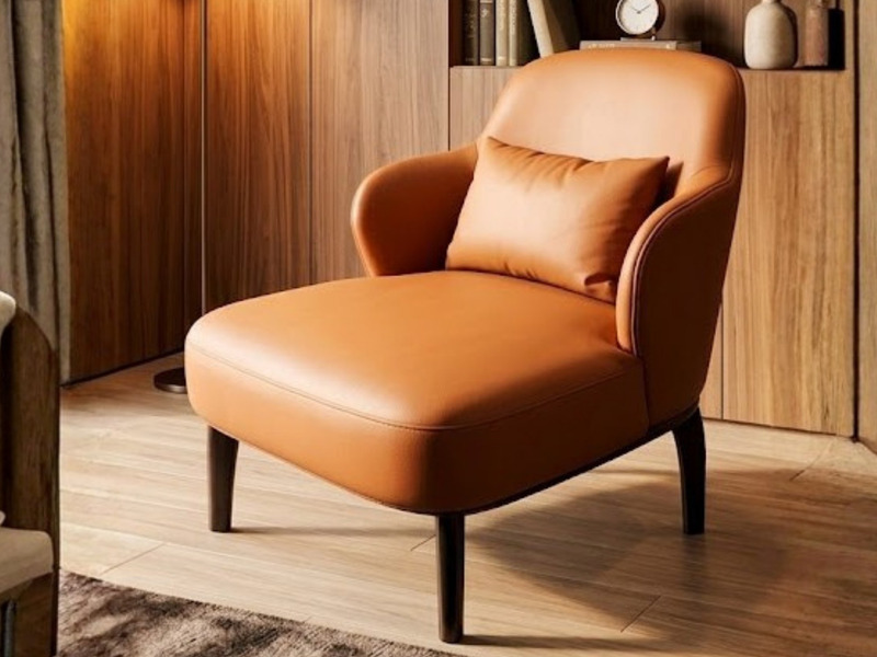 Ghế thư giãn Monaco19 màu cam đất, chụp cận cảnh từ góc hơi chếch phía trước. Ghế có thiết kế hiện đại với lưng tựa và tay…