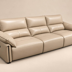 Ghế sofa băng ba COCOON màu be nhạt, chụp từ góc nghiêng, cho thấy toàn bộ chiều dài của ghế. Thiết kế hiện đại với các đệ…