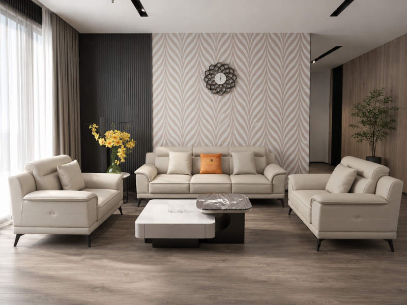 Góc nhìn tổng thể bộ sofa da Belluno SB01 từ phía trước, với sofa băng ba chỗ và hai ghế đơn, tông màu kem nhã nhặn, kết h…