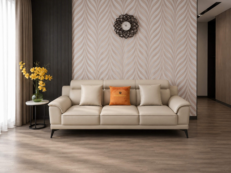 Toàn cảnh bộ sofa da Belluno SB01 màu kem nhạt đặt trong phòng khách, với sofa băng chính và hai ghế đơn, tạo không gian t…
