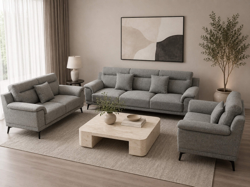 Bộ sofa Belluno SB01 gồm một băng 3 và hai băng 1, đặt trong không gian phòng khách ấm cúng với bàn trà gỗ và cây xanh tra…