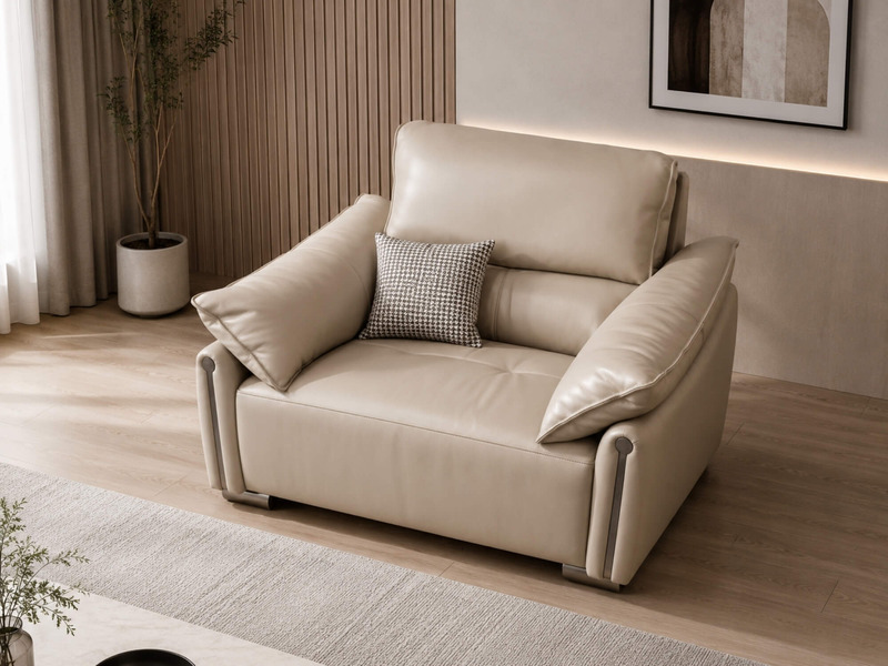 Sofa đơn COCOON SB8179 nhìn từ góc trên, có gối tựa nhỏ màu xám đặt trên đệm lưng. Thiết kế hiện đại với tay vịn bo tròn m…