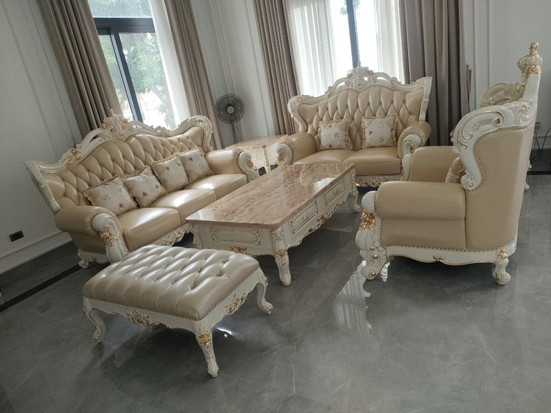 Bộ sofa tân cổ điển bọc da chần khuy kim cương, ghế bành chạm khắc dát vàng tại nhà khách hàng – Nội Thất Gia Khánh