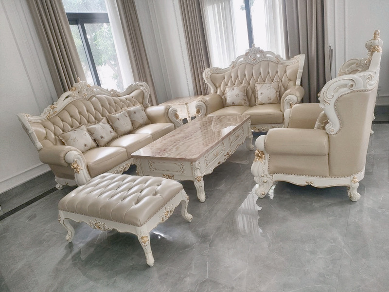 Bộ sofa tân cổ điển bọc da chần khuy kim cương, ghế bành chạm khắc dát vàng tại nhà khách hàng – Nội Thất Gia Khánh